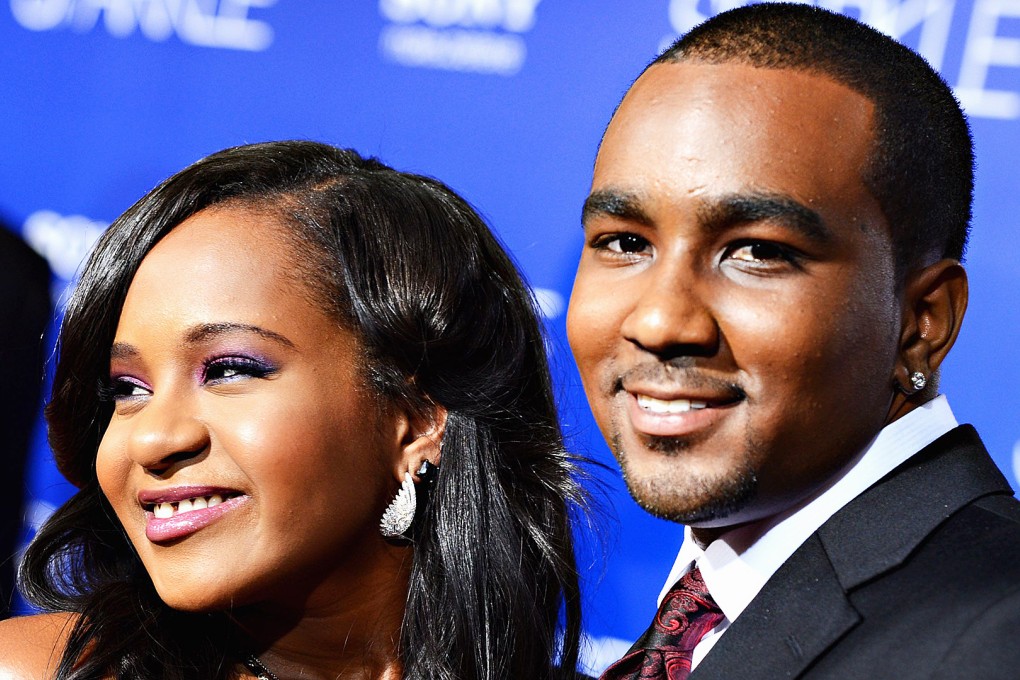 Bobbi Kristina Brown (left) and Nick Gordon arrive at Tri-Star Pictures' Sparkle premiere at Grauman's Chinese Theatre on August 16, 2012 in Hollywood, California. Photo: AFP