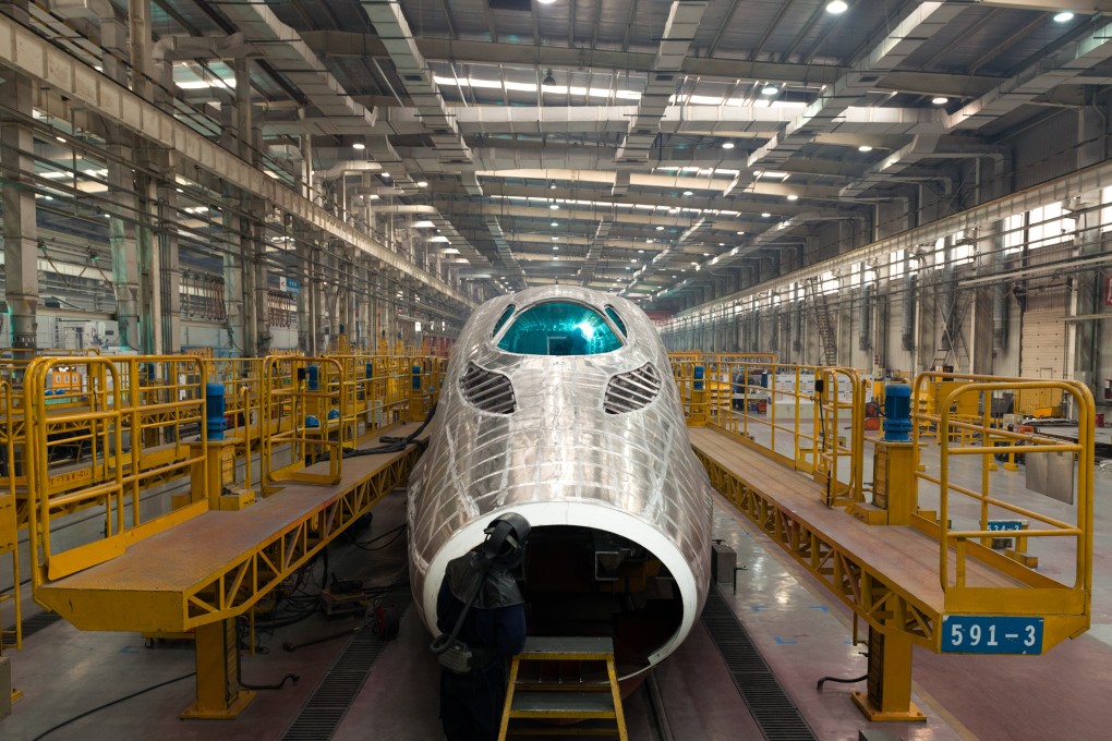 A high-speed train is assembled at a plant in Qingdao, Shandong province. An interdepartmental task force has been set up to overhaul manufacturing. Photo: Xinhua