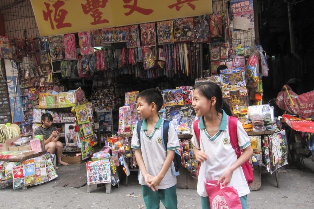 Su Zexin, eight, and his sister Su Xumin, 10, hope to enter a state school.  Photo: Vivian Chiu