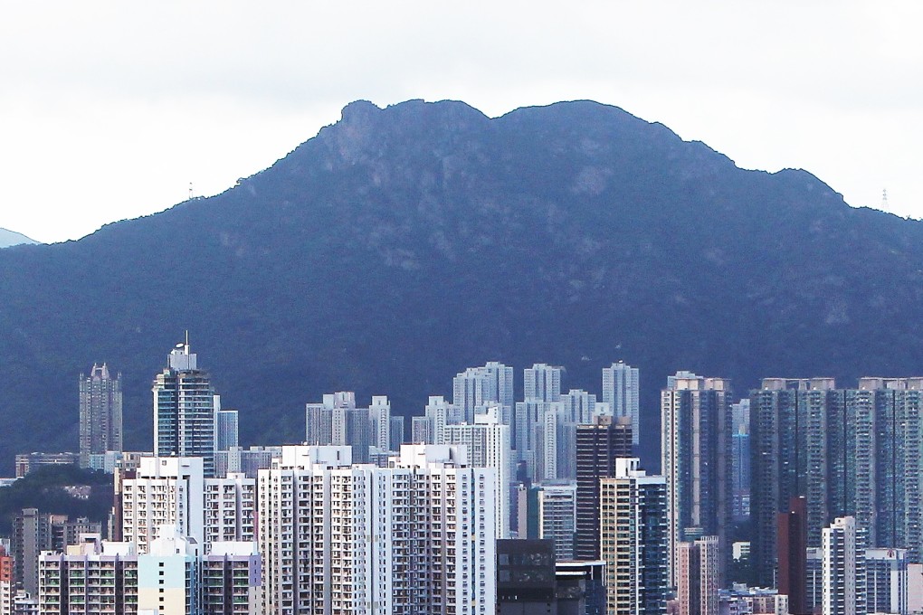 Lion Rock, inspiration for a hit television series and theme song, shadows Kowloon. Photo: Felix Wong