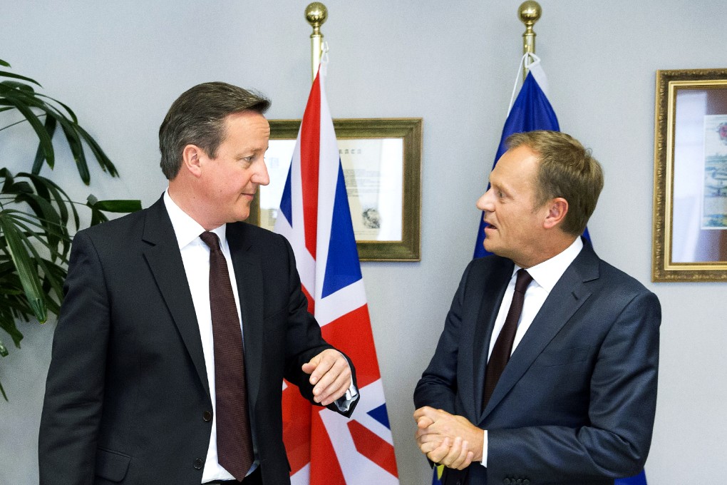 British Prime Minister David Cameron (left) speaks with European Council President Donald Tusk during a meeting on the sidelines of an EU summit in Brussels, on June 25, 2015. Photo: AP