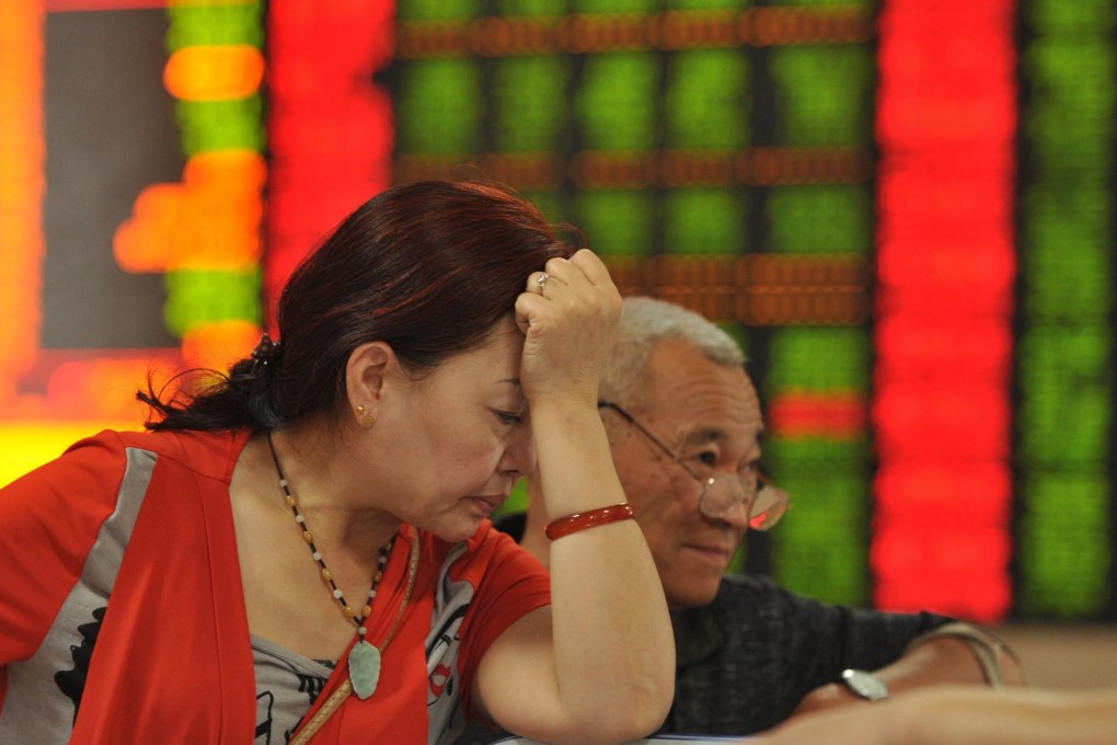 Retail investors show the strain yesterday, with almost 80 per cent of mainland stocks falling by the 10 per cent daily limit. Photo: EPA