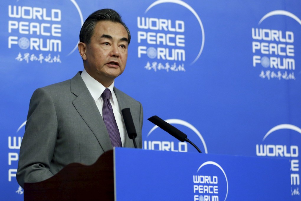 China's Foreign Minister Wang delivers a speech at a session of the World Peace Forum at the Tsinghua University in Beijing. Photo: Reuters