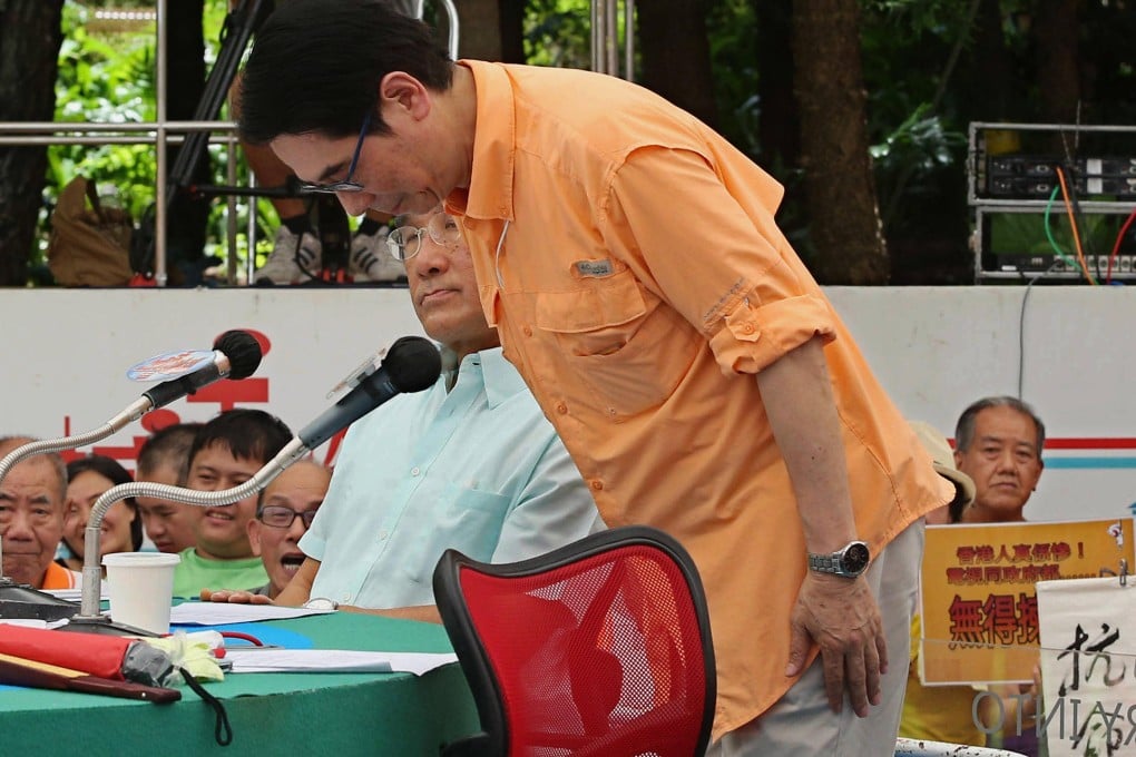 Wong Kwok-kin bows in a televised display of contrition over the vote fiasco. Photo: SCMP Pictures
