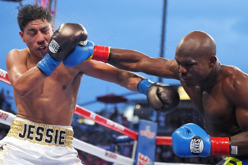 Timothy Bradley connects against Jessie Vargas during their interim WBO welterweight bout in Carson, California. Photo: AP