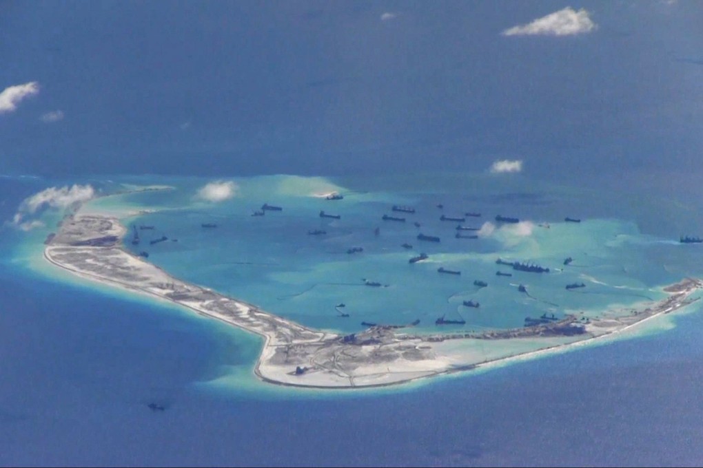 Chinese dredging vessels are purportedly seen in the waters around Mischief Reef in the disputed Spratly Islands in the South China Sea in this file still image from video taken by a P-8A Poseidon surveillance aircraft provided by the US Navy on May 21, 2015. Photo: Reuters