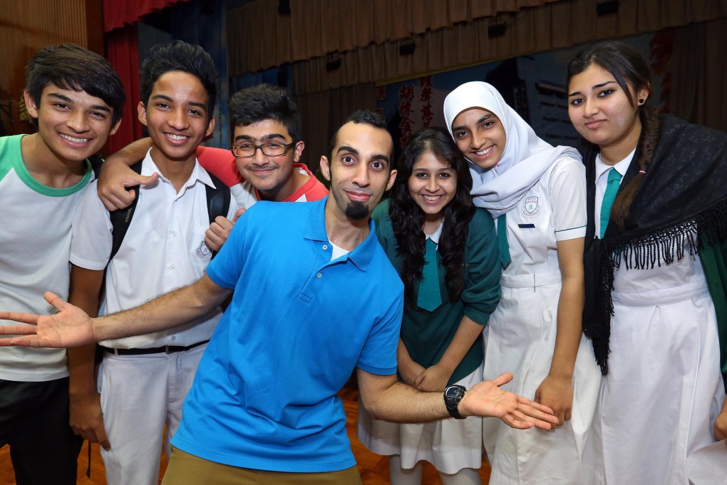 Vivek Mahbubani with students from Mrs Aw Boon Haw Secondary School. Photos: Janice Leung, Edmond So