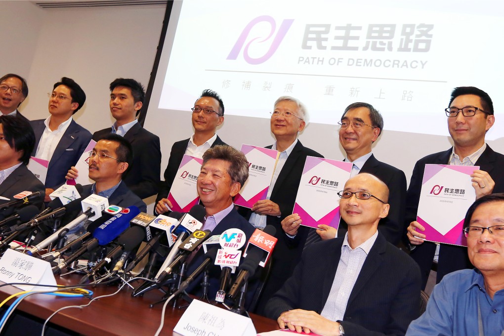 Legislator Ronny Tong Ka-wah (front centre) announces the launch of new think-tank and political platform "Path of Democracy" for democratic development at the Legco Complex in Tamar. He said Hongkongers must find a third way to achieve what they wanted or face a future of polarised political posturing that delivered them nothing. Photo: Nora Tam