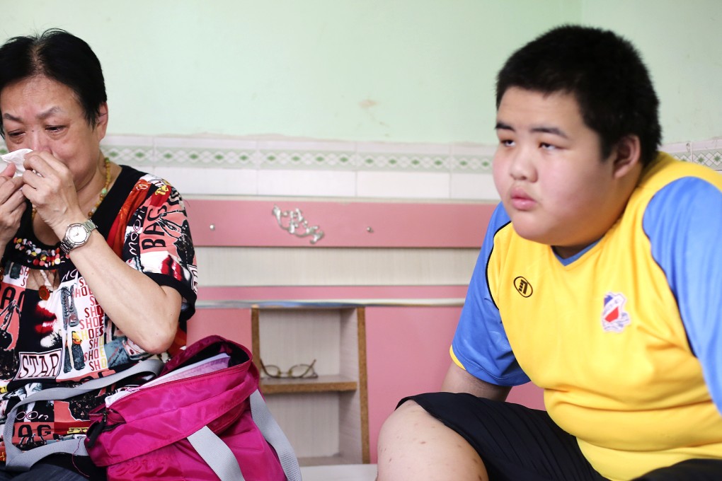 Chow Siu-shuen and her 12-year-old grandson, Siu Yau-wai, in Shenzhen. Photo: Sam Tsang