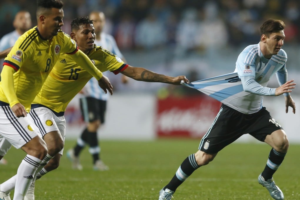 Argentina's Lionel Messi escapes the attention of defenders during the quarter final of the Copa America. Photo: AP
