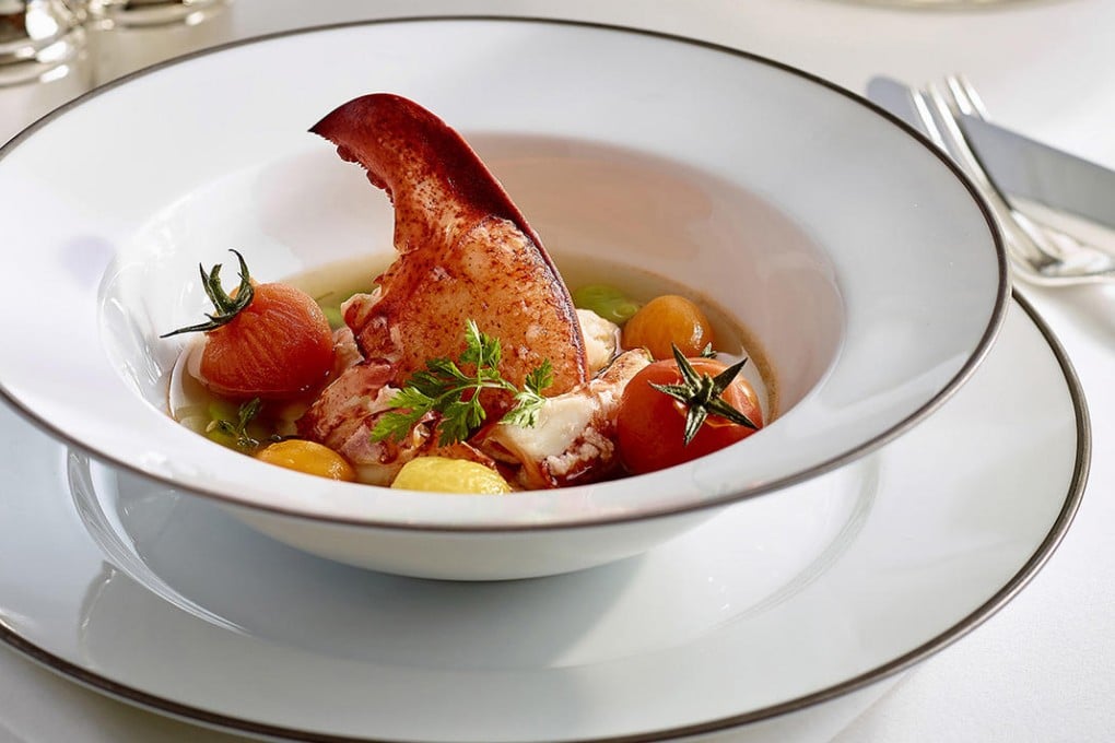 Blue lobster in bouillon with cherry tomatoes and broad beans at Hugo's at the Hyatt Regency in Tsim Sha Tsui.