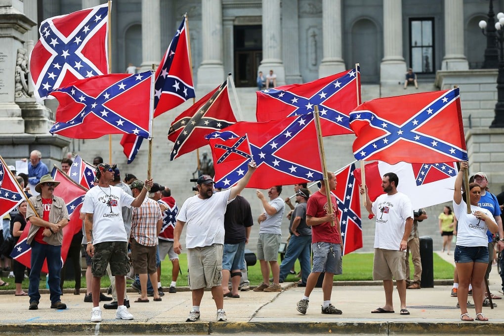 Demonstrators protest at the South Carolina State House calling for the Confederate flag to remain on the State House grounds  in Columbia, South Carolina. Photo: AFP