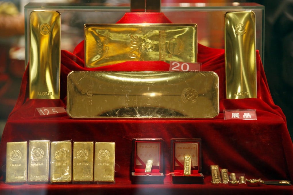 Gold bars of various sizes are seen in a store in Beijing as China plans to establish a yuan price fix to take advantage of the country's positions as the world's top producer and a leading consumer of the precious metal. Photo: Reuters