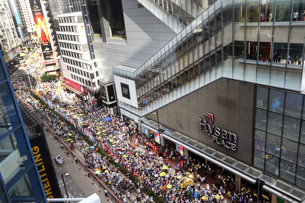 Protesters snake through Causeway Bay. Photo: Sam Tsang