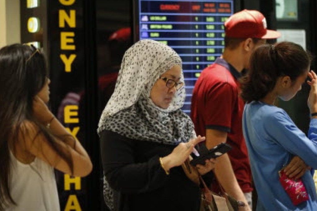 Fitch said Malaysia’s fiscal finances had improved. Photo: AP
