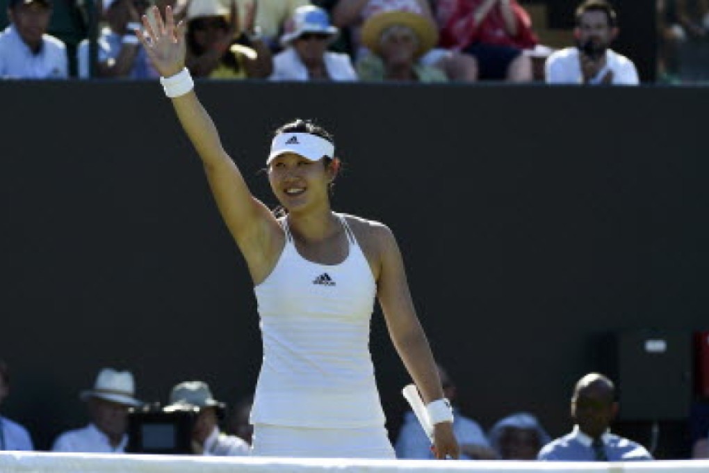 China's Duan Yingying celebrates after beating Canada's Eugenie Bouchard in the first round of Wimbledon. Photo: Reuters