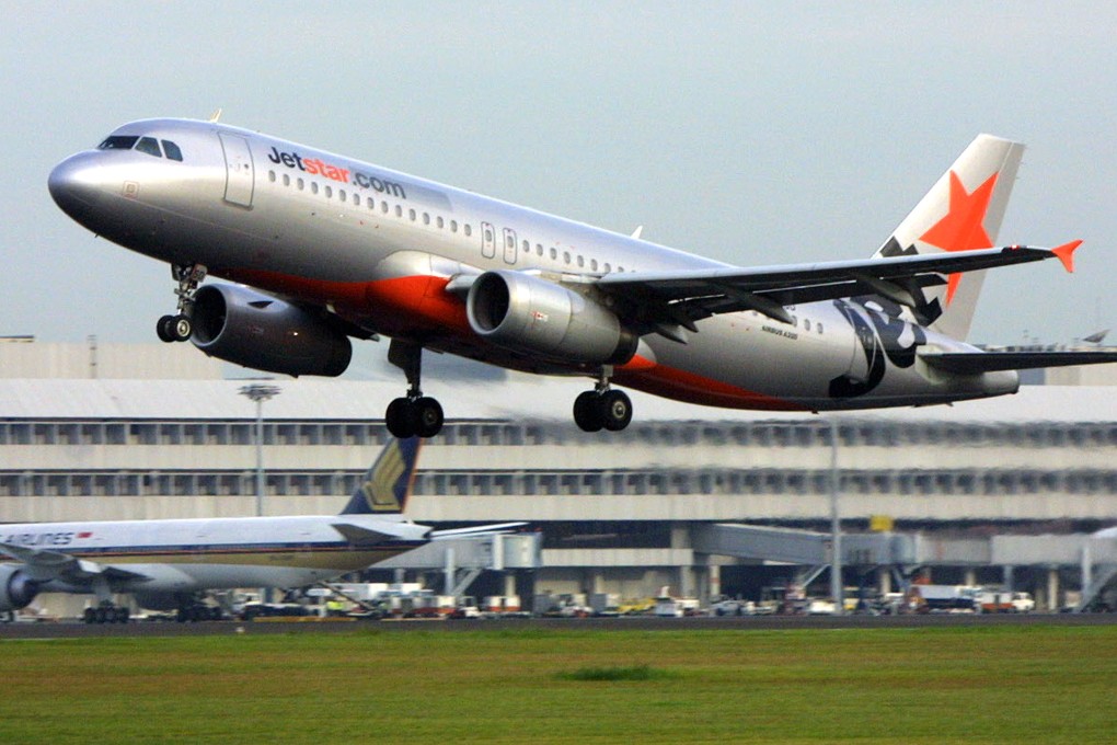 A Jetstar Airbus takes off as the decision against the company in Hong Kong is rejected by the government of the city. Photo: AFP