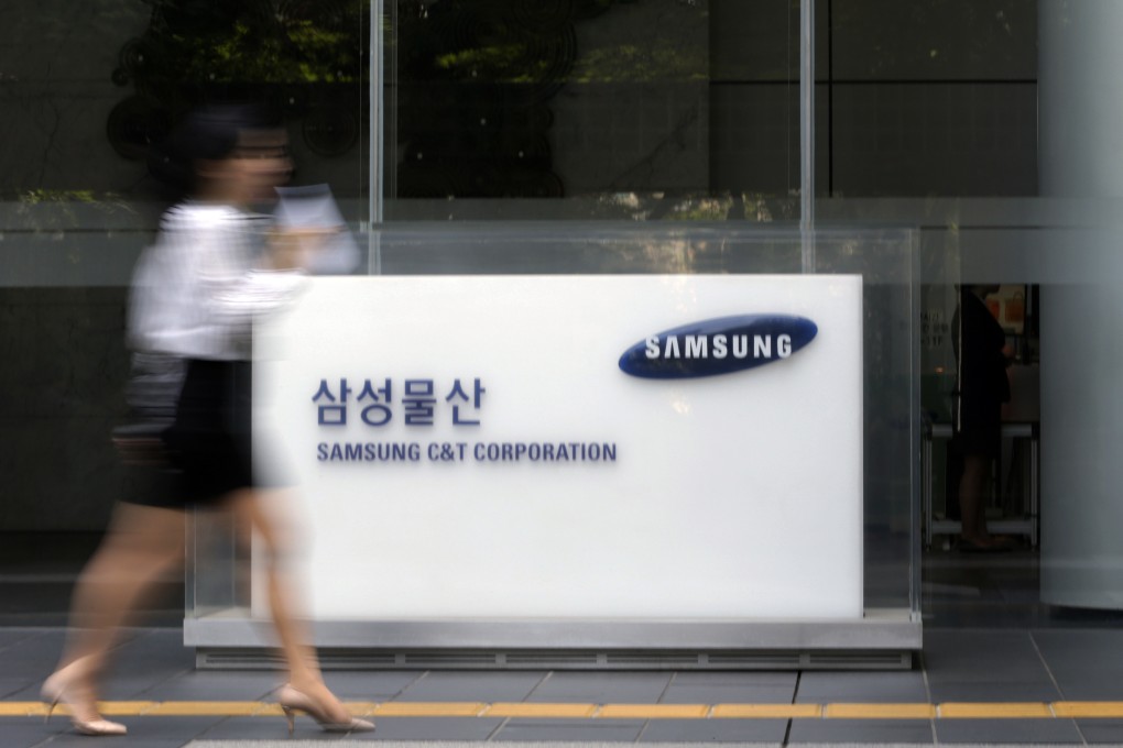 A person walks by the Samsung C&T offices in Korea where a court ruled in favour of the US$8 billion merger of two Samsung Group companies. Photo: AP