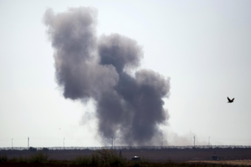 Smoke rises amid fierce fighting in North Sinai.Photo: Reuters
