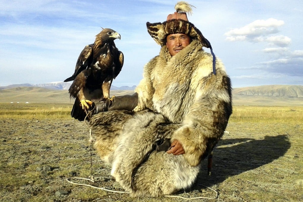 Shohan, a friendly Kazakh eagle hunter, is your host for the start of the Mongolian adventure. Photo: Adrian Bottomley