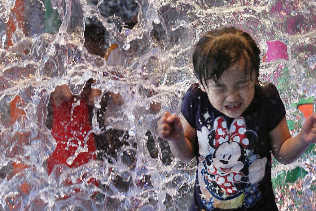 At least one youngster found a way to cool off at Ocean Park yesterday.Photo: Nora Tam