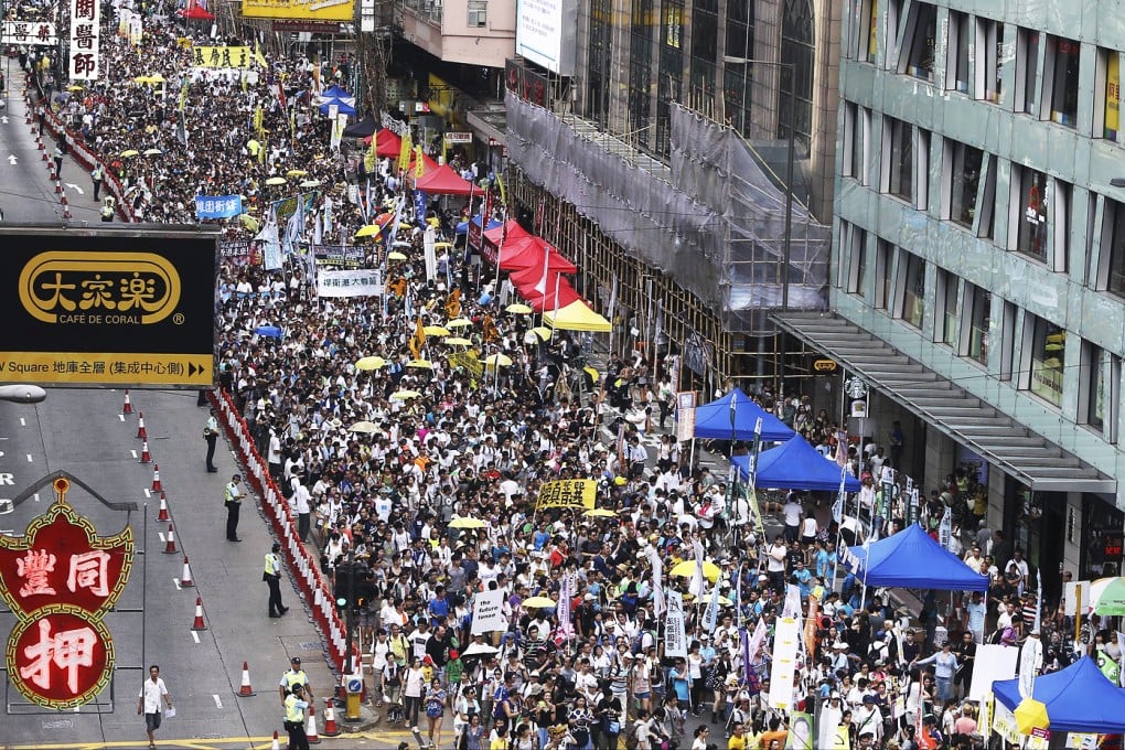 Protesters on their way to the government offices. Organisers said 48,000 rallied; police said the number peaked at 19,650. Photo: Sam Tsang