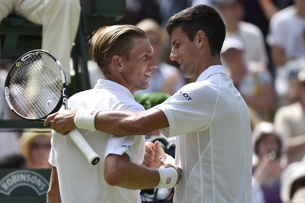 A fond farewell for Finland’s Jarkko Nieminen (left) from Novak Djokovic after their second-round match at Wimbledon. Photo: AFP
