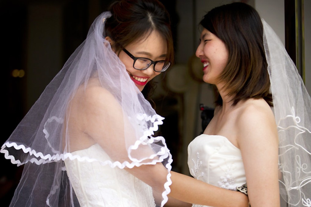 Women's rights activist Li Tingting, above, and her partner Teresa Xu declared their marriage at a gathering in front of friends and journalists. Photo: AP