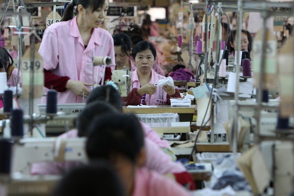 A file picture of a clothing factory in Shenzhen. The city has set the highest minimum wage among the 14 to raise rates this year, according to the report. Photo: SCMP Pictures