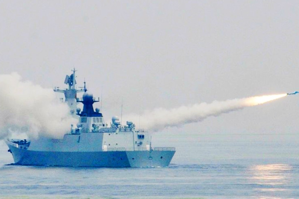 A ship launches a missile during the training exercise. Photo: China News Service