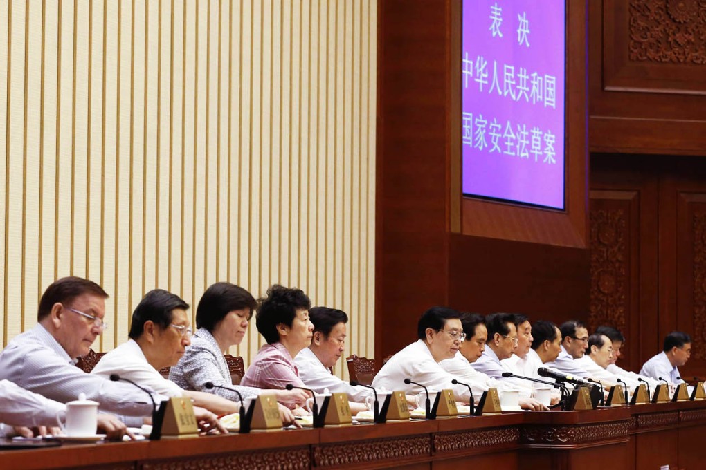 The National People's Congress Standing Committee passes the national security law in Beijing on Wednesday. Photo: CNS