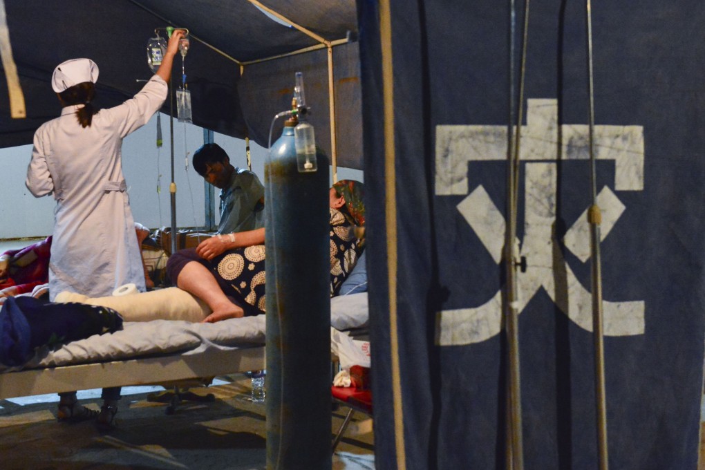 Chinese authorities have revised down the death toll to three from Friday's temblor in Xinjiang. Photo: Xinhua