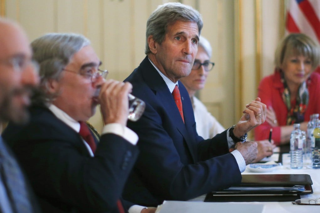 US Secretary of State John Kerry, centre, meets with Iranian Foreign Minister Mohammad Javad Zarif in Vienna. Photo: AP