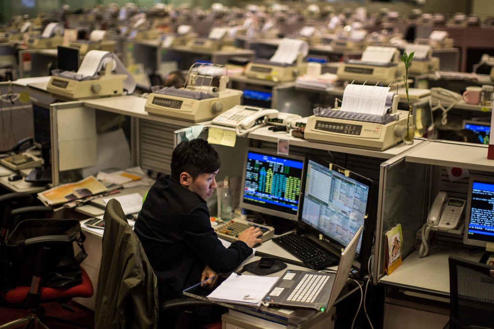 Hong Kong's benchmark Hang Seng Index is up 10.42 per cent this year, compared with a 13.98 per cent gain for Shanghai. Photo: AFP