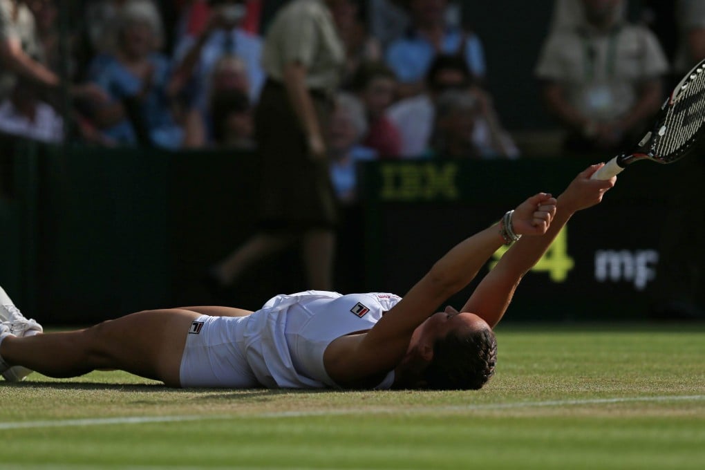 Serbia's Jelena Jankovic celebrates beating women's titleholder Petra Kvitova in the third round at Wimbledon. Photos: AFP