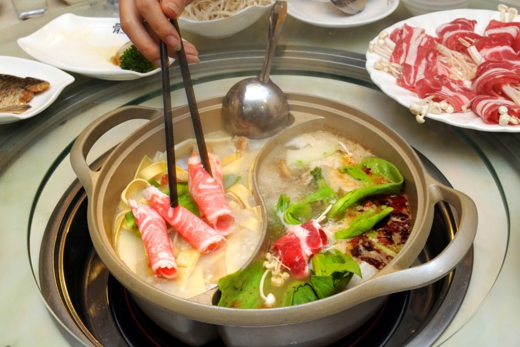A diner prepares to feast on hot pot. Frozen meat smuggled into the mainland was destined for a range of outlets, including restaurants. Photo: Imaginechina