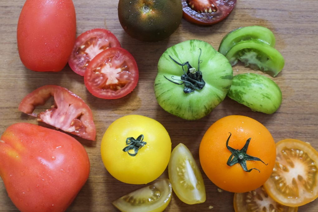 Various tomatoes that can be found at the Ritz-Carlton Hong Kong's Organic Salad Bar: Black Krim (brown), Tigerella (green), Sun Gold (orange and yellow), Ox Heart (big red) and Roma (small red). Photos; Jeanette Wang