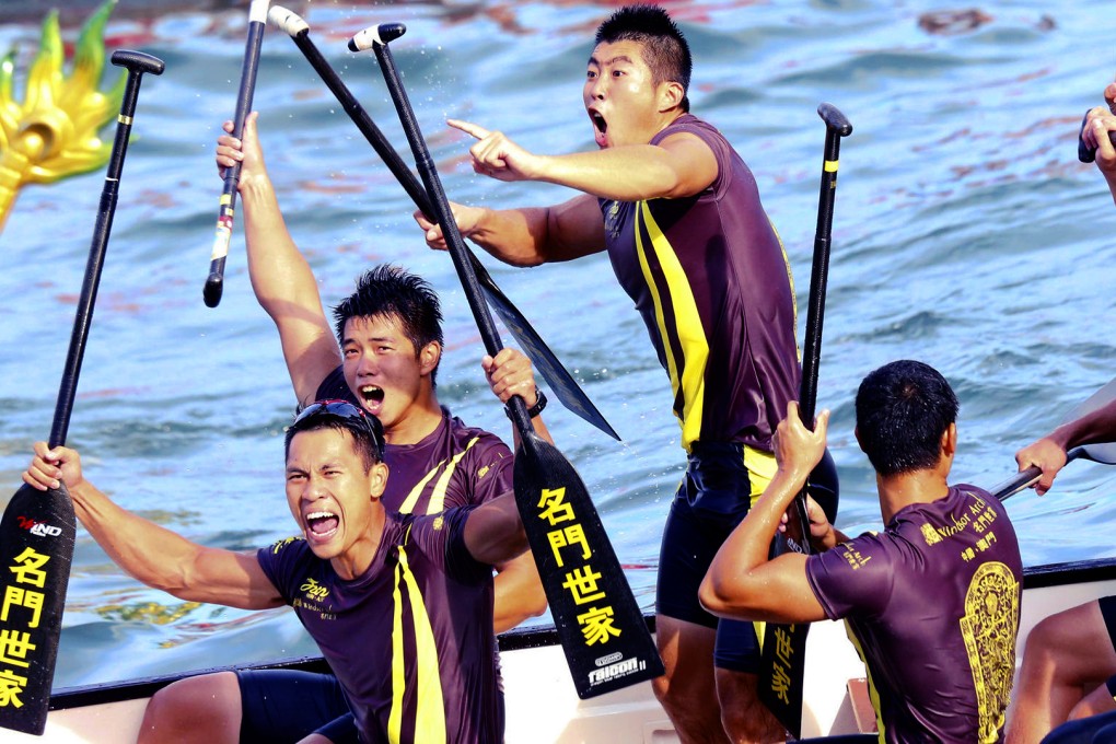 Windsor Arch Nanhai Jiujiang dragon boat team celebrate victory in the Chairman Shield at Tsim Sha Tsui yesterday.Photo: David Wong