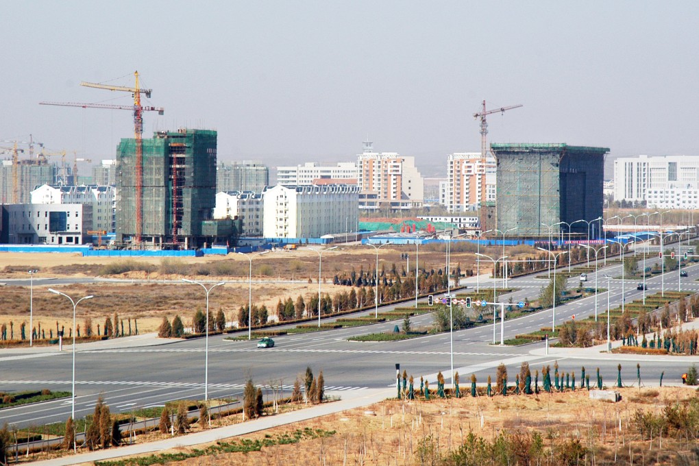 In the Inner Mongolia city of Erdos, notorious as a "ghost city" after a building frenzy failed to attract buyers and residents, authorities in Dongsheng district bought houses in April and May. Photo: Zhao Yajun