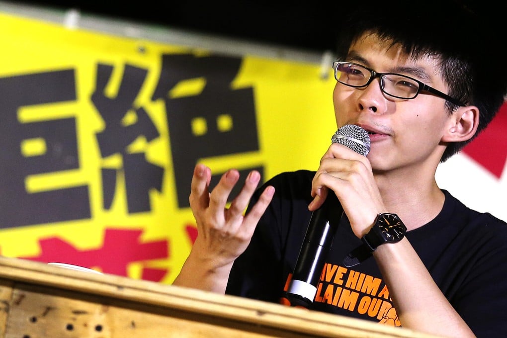 Joshua Wong received news he would face charges as he was about to leave Hong Kong for a holiday in Japan. Photo: David Wong