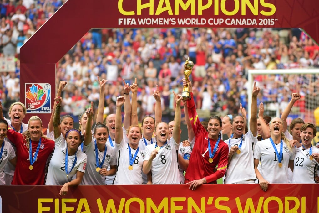 Goalkeeper Hope Solo hoists the Women's World Cup trophy after the United States beat Japan 5-2 in the final at BC Place Stadium. Photo: USA TODAY Sports