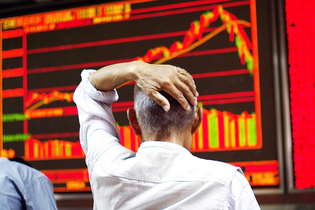 An investor keeping an eye on Shanghai stocks watches in seeming consternation as share prices gyrate wildly the past few days. Photo: EPA