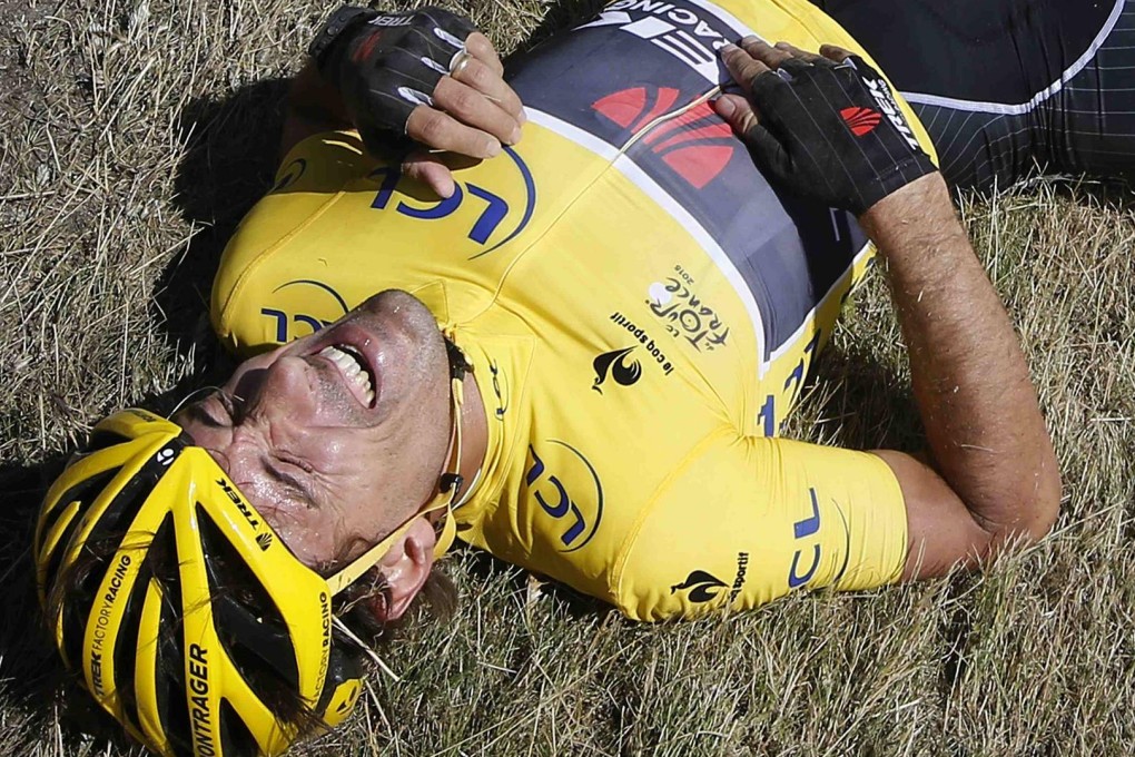 Yellow-jersey holder Fabian Cancellara lies on the ground after a fall during the third stage of the Tour de France. Photo: Reuters