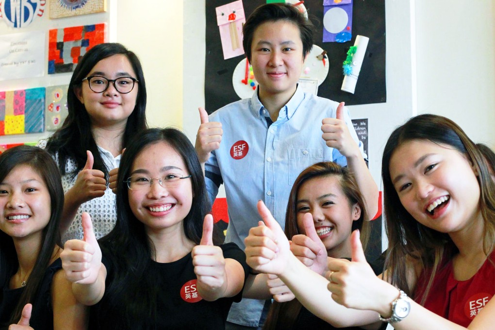 Thumbs up from some of the English Schools Foundation students who received a perfect International Baccalaureate score. Photo: May Tse