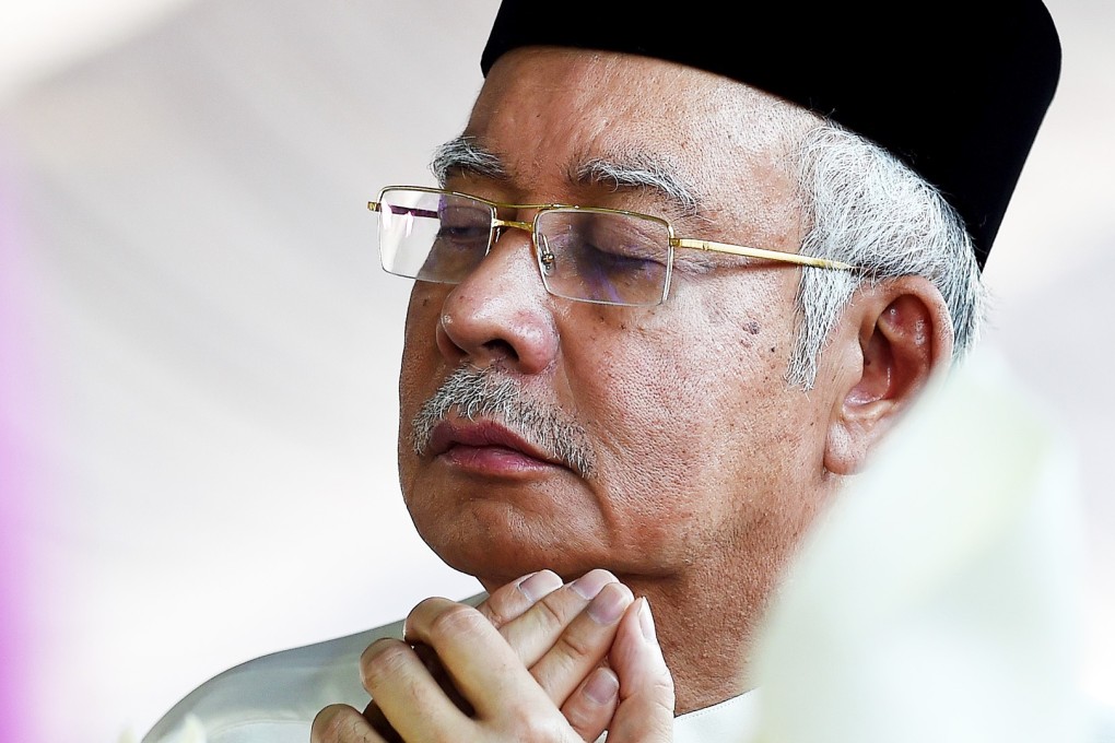 Malaysian Prime Minister Najib Razak has denied taking any money from 1MDB or any other entity for personal gain and is considering legal action. Photo: AFP