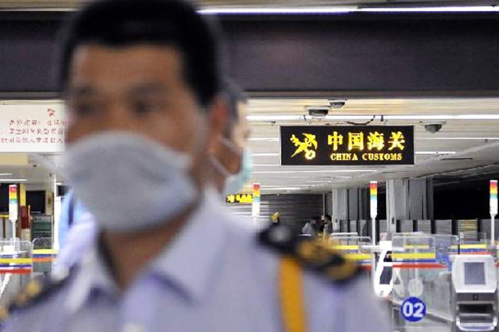 The former deputy head of Shenzhen customs' inspection division has been charged with adultery and accepting bribes. File Photo