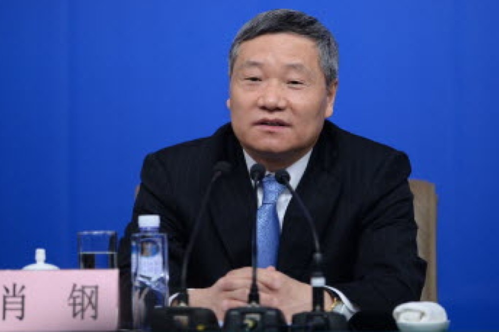 CSRC chairman Xiao Gang told a forum in June it wanted to speed up the development of domestic capital markets. Photo: Xinhua