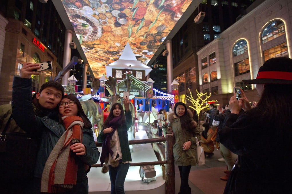 By Christmas, it could be normal to authorise payments on your smartphone by simply taking a selfie, if credit card issuers and e-commerce giants have their way. Photo: AP