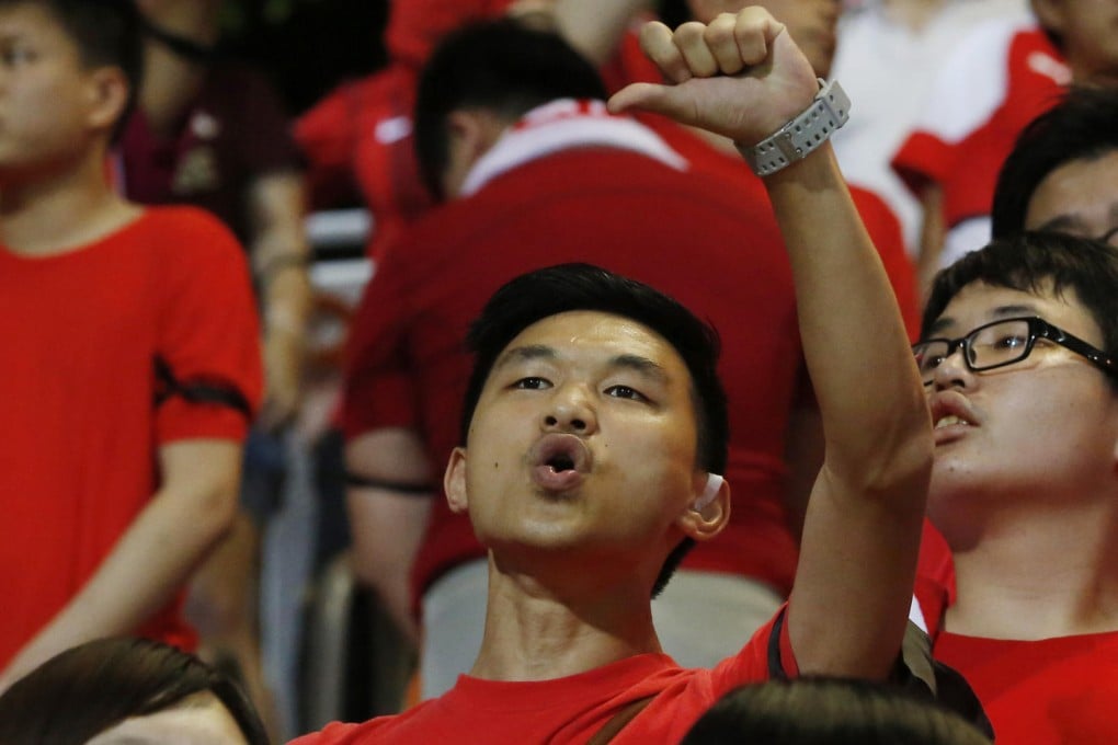 A Hong Kong fan boos the national anthem at the World Cup qualifier between Hong Kong and the Maldives last month. Photos: AP