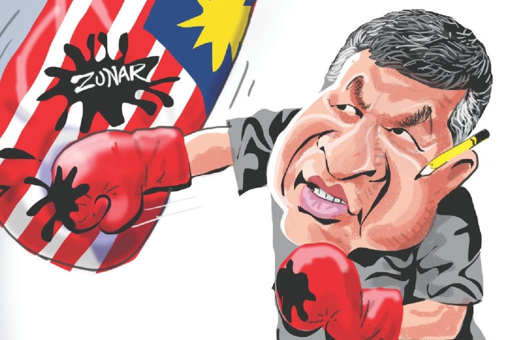 Malaysia's cartoonist Zunar vows not to pull punches over embattled leader Najib Razak